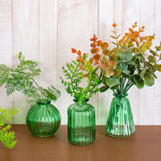 Set of 3 small green glass bud vases